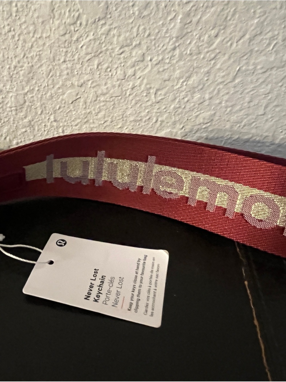 lululemon athletica Never Lost Keychain Strap in Burgundy with Metallic Logo